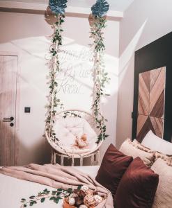 Postel nebo postele na pokoji v ubytování Aslyra "Appart-hôtel"