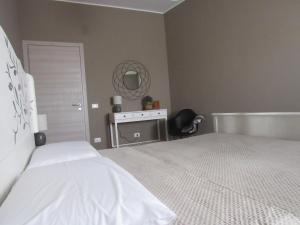 A bed or beds in a room at Il Rifugio dei Briganti