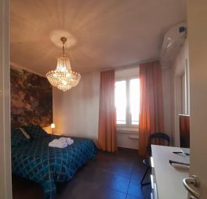 Katil atau katil-katil dalam bilik di Porta Venezia Apartment
