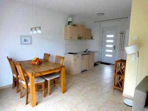 Kuchyň nebo kuchyňský kout v ubytování Küstenwald - Ferienwohnung Igelring J56