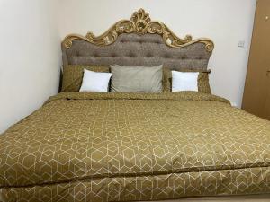 Кровать или кровати в номере Cozy Stay for Group/Family