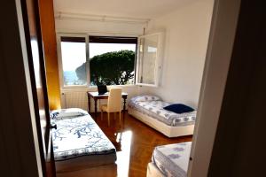 Vuode tai vuoteita majoituspaikassa Relax Apartment 5 by Wonderful Italy