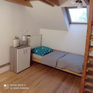Postel nebo postele na pokoji v ubytování Apartmán Chroustkov