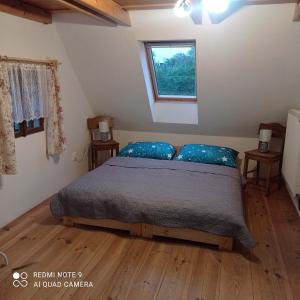 Ένα ή περισσότερα κρεβάτια σε δωμάτιο στο Apartmán Chroustkov
