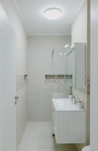 Ένα μπάνιο στο Royal Blue Property