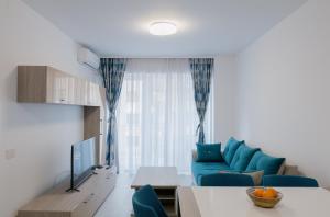 Μια τηλεόραση ή/και κέντρο ψυχαγωγίας στο Royal Blue Property