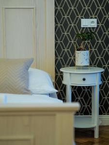 Postel nebo postele na pokoji v ubytování Stupartska - Premium Old Town Residence