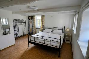 Postel nebo postele na pokoji v ubytování Ferienhaus Altes Wirtshaus