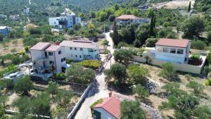 an aerial view of a small town with houses at Villa A&M in Vinišće