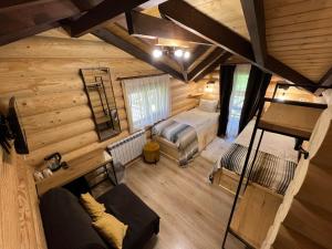 an overhead view of a bedroom in a log cabin at BerBen House in Vorokhta