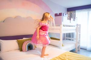 Postel nebo postele na pokoji v ubytování Hotel Magic Fantasy