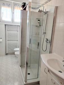 a bathroom with a shower and a sink at Private room and bathroom close to Piazzale Roma in Venice Mestre in Mestre
