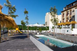 Bazén v ubytování Hotel Avenida Tropical by Bossh! Hotels nebo v jeho okolí