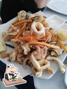 a plate of shrimp with a cartoon character on it at LITHOS guest room in Barletta
