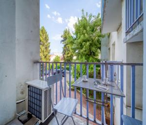 En balkon eller terrasse på Le petit spacieux 3