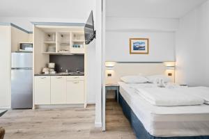 Ein Bett oder Betten in einem Zimmer der Unterkunft Family Resort del Mar