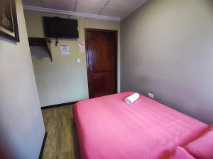 alborada cuenca hospedaje tesisinde bir odada yatak veya yataklar