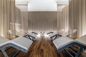 a waiting room at a hospital with rows of beds at Sandman Signature Aberdeen Hotel & Spa in Aberdeen