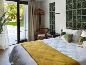 Кровать или кровати в номере Le Petit Boutique Hotel