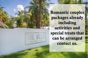 a sign for the villas at the villas at The Villa Manor & Spa in Bela-Bela