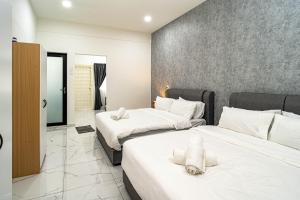 Voodi või voodid majutusasutuse 10 mint drive to Mid Valley KL near Gateway Bangsar Seputeh toas