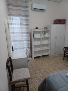 Posteľ alebo postele v izbe v ubytovaní B&B Appartamenti NAPOLI