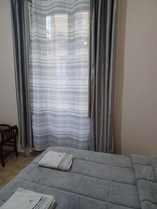 Posteľ alebo postele v izbe v ubytovaní B&B Appartamenti NAPOLI
