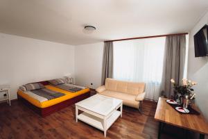 Postel nebo postele na pokoji v ubytování Kalwados
