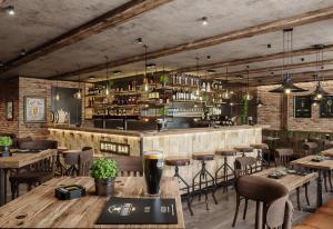a restaurant with tables and chairs and a bar at BERG & BERG Hotel - Hellbühl Self-Check-in in Hellbühl +32 photos