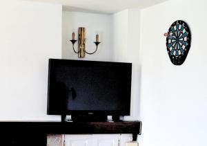 TV a/nebo společenská místnost v ubytování Casa de Travassos
