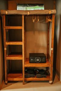 a bunk bed with a radio on a shelf at Soroi Luxury Migration Camp in Sekenani