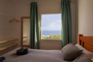 Posteľ alebo postele v izbe v ubytovaní Beach Front Villa Amazing Views