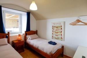 Posteľ alebo postele v izbe v ubytovaní Beach Front Villa Amazing Views