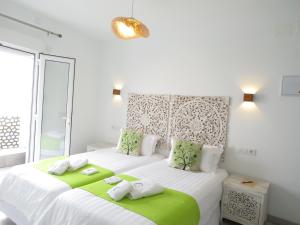 Lua Hotel Boutique客房内的一张或多张床位