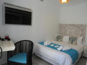 Lua Hotel Boutique客房内的一张或多张床位