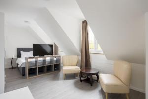TV a/nebo společenská místnost v ubytování Superior Studio On Top Floor BE-51