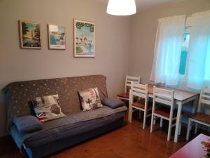 A seating area at Apartamentos Guadalupe