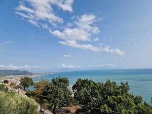 a view of the ocean from a hill at Torre del Principe suite in Salerno