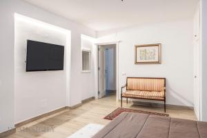 Et tv og/eller underholdning på La Dimora del Mare by Domus Sicily