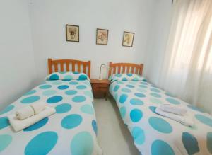 Posteľ alebo postele v izbe v ubytovaní Apartment Cala de Nerja SpainSunRentals 1083