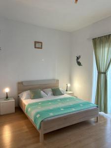 Postel nebo postele na pokoji v ubytování Apartments Valjan
