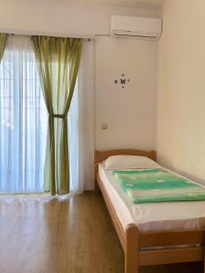 Postel nebo postele na pokoji v ubytování Apartments Valjan