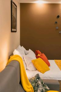 Posteľ alebo postele v izbe v ubytovaní Apartament Pod 13