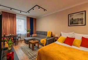 Posteľ alebo postele v izbe v ubytovaní Apartament Pod 13