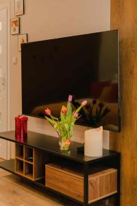 Posteľ alebo postele v izbe v ubytovaní Apartament Pod 13