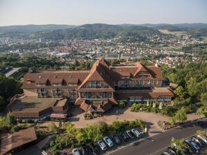 an aerial view of a large house with a parking lot at Hotel Pergola im Göbels Hotel Rodenberg in Rotenburg an der Fulda