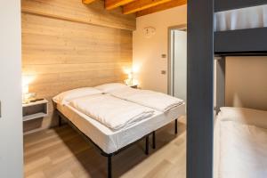 Postel nebo postele na pokoji v ubytování B&B Piazza