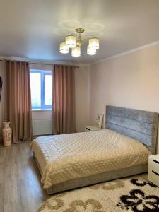 Posteľ alebo postele v izbe v ubytovaní River Apartments