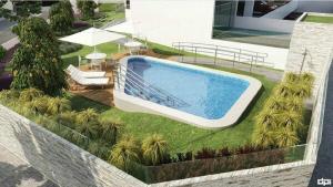 Bazén v ubytovaní EDF Costa Do Rio(Flat) alebo v jeho blízkosti
