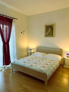 Postel nebo postele na pokoji v ubytování Apartments Valjan